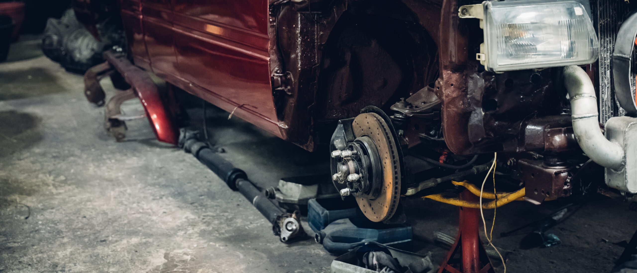 Brakes on the car and different equipment in a garage